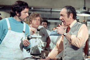 Carry On At Your Convenience. Image shows from L to R: Vic Spanner (Kenneth Cope), Willie (Geoffrey Hughes), Sid Plummer (Sid James). Copyright: Peter Rogers Productions