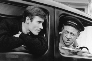 Carry On Cabby. Image shows from L to R: Jeremy (Jim Dale), Charlie Hawkins (Sid James). Copyright: Peter Rogers Productions / STUDIOCANAL