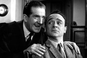 Carry On Teacher. Image shows from L to R: Mr. William Wakefield (Ted Ray), Mr. Gregory Adams (Kenneth Connor). Copyright: Peter Rogers Productions