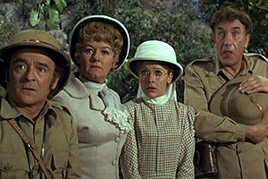 Carry On Up The Jungle. Image shows from L to R: Claude Chumley (Kenneth Connor), Lady Evelyn Bagley (Joan Sims), June (Jacki Piper), Prof. Inigo Tinkle (Frankie Howerd). Copyright: Peter Rogers Productions / Rank Organisation