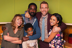 Carters Get Rich. Image shows from L to R: Liz Carter (Kerry Godliman), Harry Carter (Rio Chambers), Tony Carter (Rhashan Stone), Trent Zebrisky (James Van Der Beek), Ellie Carter (Rhianna Merralls)