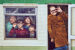 Changing Ends. Image shows left to right: Graham Carr (Shaun Dooley), Young Alan Carr (Oliver Savell), Christine Carr (Nancy Sullivan), Gary Carr (Taylor Fay), Present Day Alan (Alan Carr). Credit: Baby Cow Productions