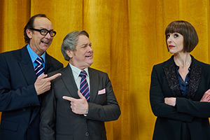 Christmas Carole. Image shows left to right: Eric Morecambe (Jonty Stephens), Ernie Wise (Ian Ashpitel), Carole Mackay (Suranne Jones)