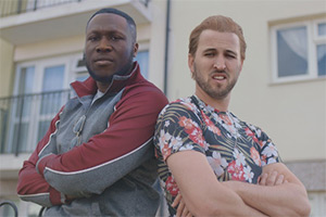 Deep Fake Neighbour Wars. Image shows left to right: Stormzy (Kane Brown), Harry Kane (Luke Kempner)