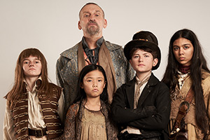 Dodger. Image shows left to right: Polly Crackitt (Ellie-May Sheridan), Tang (Mila Lieu), Fagin (Christopher Eccleston), Dodger (Billy Jenkins), Charley Bates (Aabay Ali)