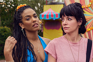 Dreamland. Image shows from L to R: Trish (Freema Agyeman), Mel (Lily Allen)