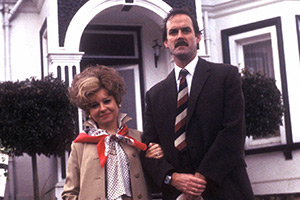 Fawlty Towers. Image shows left to right: Sybil Fawlty (Prunella Scales), Basil Fawlty (John Cleese). Credit: BBC