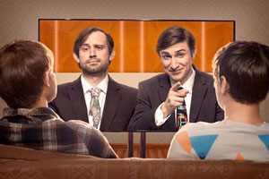 Flat TV. Image shows from L to R: Naz (Naz Osmanoglu), Tom (Tom Rosenthal). Copyright: BBC