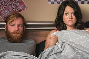 Frank Of Ireland. Image shows from L to R: Frank (Brian Gleeson), Áine (Sarah Greene)