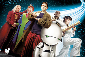 The Hitchhiker's Guide To The Galaxy. Image shows left to right: Zaphod Beeblebrox (Sam Rockwell), Humma Kavula (John Malkovich), Arthur Dent (Martin Freeman), Ford Prefect (Mos Def), Trillian (Zooey Deschanel)