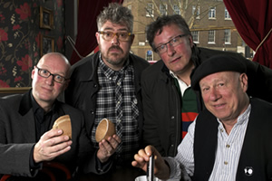 In Transit. Image shows from L to R: Ade (Adrian Edmondson), Phill (Phill Jupitus), Rowland (Rowland Rivron), Neil (Neil Innes). Copyright: Giddy Goat Productions