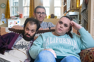 Jerk. Image shows left to right: Tim (Tim Renkow), Idris (Rob Madin), Ruth (Sharon Rooney)