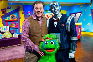 Justin's House. Image shows from L to R: Justin (Justin Fletcher), Little Monster, Robert the Robert (Steven Kynman). Copyright: BBC Justin's House. Image shows from L to R: Justin (Justin Fletcher), Little Monster, Robert the Robert (Steven Kynman). Copyright: BBC