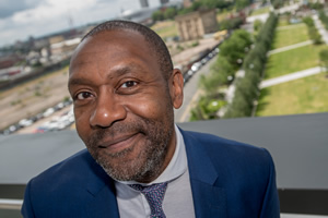 Birmingham City University Chancellor, Sir Lenny Henry, poses in front of the institution's City Centre Campus, from the balcony of the University's new £63 million Curzon Building. Lenny Henry. Copyright: Birmingham City University