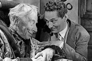 Make Me An Offer!. Image shows from L to R: Sir John (Ernest Thesiger), Charlie (Peter Finch)