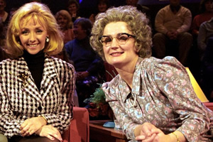 The Mrs Merton Show. Image shows from L to R: Debbie McGee, Mrs Merton (Caroline Aherne). Copyright: Granada Productions