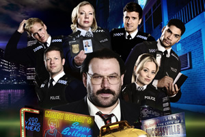 Murder In Successville. Image shows from L to R: Jamie Laing, Dermot O'Leary, Deborah Meaden, DI Sleet (Tom Davis), Greg James, Kimberly Wyatt, Louis Smith. Copyright: Tiger Aspect Productions