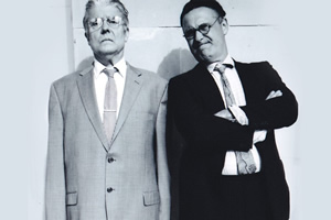 The National Theatre Of Brent's Illustrated Guide To Sex And How It Was Done. Image shows from L to R: Desmond Olivier Dingle (Patrick Barlow), Raymond Box (John Ramm)