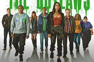 The Outlaws. Image shows from L to R: John (Darren Boyd), Christian (Gamba Cole), Gabby (Eleanor Tomlinson), Greg (Stephen Merchant), Rani Rekowski (Rhianne Barreto), Frank (Christopher Walken), Myrna (Clare Perkins), Diane (Jessica Gunning)