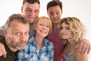 Outnumbered. Image shows left to right: Pete (Hugh Dennis), Ben (Daniel Roche), Sue (Claire Skinner), Jake (Tyger Drew-Honey), Karen (Ramona Marquez)