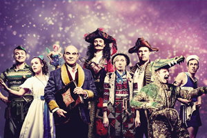 Peter Pan Goes Wrong. Image shows from L to R: Jonathan (Peter Pan) (Greg Tannahill), Sandra (Wendy) (Charlie Russell), Annie (Mrs Darling / Lisa / Tinkerbell) (Nancy Zamit), The Narrator (David Suchet), Chris (Hook) (Henry Shields), Lucy (Tootles) (Ellie Morris), Robert (Starkey) (Henry Lewis), Max (Crocodile) (Dave Hearn), Dennis (Smee) (Jonathan Sayer). Copyright: Idil Sukan