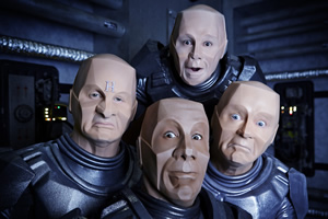 Red Dwarf. Image shows from L to R: Rimmer (Chris Barrie), Cat (Danny John-Jules), Lister (Craig Charles), Kryten (Robert Llewellyn)