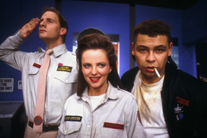 Red Dwarf. Image shows from L to R: Rimmer (Chris Barrie), Kochanski (Clare Grogan), Lister (Craig Charles). Copyright: BBC