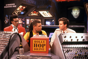 Red Dwarf. Image shows from L to R: Cat (Danny John-Jules), Lister (Craig Charles), Rimmer (Chris Barrie). Copyright: BBC