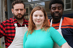 Retail Is Hell. Image shows left to right: Retail Assistant (Mathias Swann), Retail Assistant (Kara Chamberlain), Retail Assistant (Aaron Phinehas Peters)