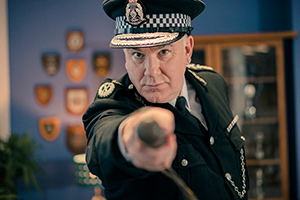 Scot Squad. Chief Commissioner Cameron Miekelson (Jack Docherty)