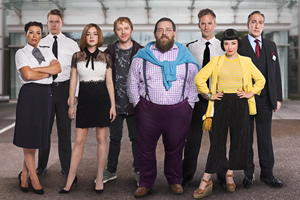 Sick Note. Image shows from L to R: Superintendent Henchy (Alison King), Officer Hayward (Daniel Rigby), Katerina West (Lindsay Lohan), Daniel Glass (Rupert Grint), Dr Iain Glennis (Nick Frost), Duty Officer Patrick (Seb Cardinal), Linda Zerafa (Marama Corlett), Dr Samson (Miles Richardson). Copyright: King Bert Productions