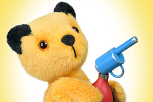 Sooty with his water pistol