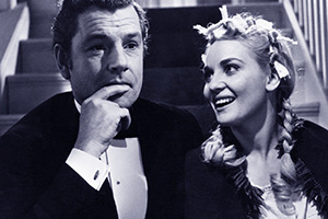 The Admirable Crichton. Image shows left to right: Bill Crichton (Kenneth More), Eliza Tweeny (Diane Cilento). Credit: Columbia Pictures