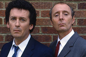 The Detectives. Image shows from L to R: Dave Briggs (Robert Powell), Bob Louis (Jasper Carrott). Copyright: Celador Productions