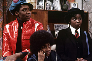 The Fosters. Image shows left to right: Sonny Foster (Lenny Henry), Benjamin Foster (Lawrie Mark), Shirley Foster (Sharon Rosita). Credit: London Weekend Television