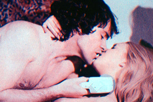 The Sex Thief. Image shows left to right: Grant Henry (David Warbeck), Angie (Gloria Walker)