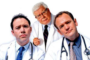 TLC. Image shows from L to R: Dr. Laurence Flynn (Reece Shearsmith), Mr. Benedict Ron (Richard Griffiths), Dr. Stephen Noble (Alexander Armstrong)