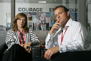 Twenty Twelve. Image shows from L to R: Siobhan Sharpe (Jessica Hynes), Ian Fletcher (Hugh Bonneville). Copyright: BBC