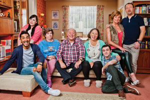 Two Doors Down. Image shows from L to R: Jaz (Harki Bhambra), Sophie (Sharon Rooney), Christine (Elaine C. Smith), Eric (Alex Norton), Beth (Arabella Weir), Ian (Jamie Quinn), Cathy (Doon Mackichan), Colin (Jonathan Watson). Copyright: BBC