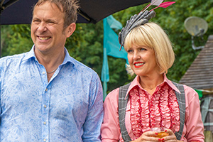 Agatha Raisin. Image shows from L to R: Sir Charles Fraith (Jason Merrells), Agatha Raisin (Ashley Jensen)