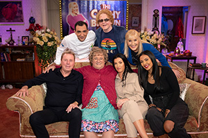 All Round To Mrs. Brown's. Image shows from L to R: Harry Redknapp, Aly Mahmoud, Mrs Brown (Brendan O'Carroll), Mick Hucknall, Sadie Benjamin, Cathy Brown (Jennifer Gibney), Maya Jama