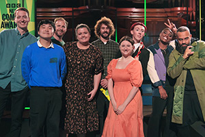 BBC New Comedy Awards. Image shows left to right: Philipp Kostelecky, Jin Hao Li, Colin Hoult, Tal Davies, Josh Pugh, Lorna Rose Treen, Lachlan Werner, Thanyia Moore, Guz Khan