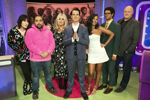 The Big Fat Quiz Of The Year. Image shows from L to R: Noel Fielding, Asim Chaudhry, Roisin Conaty, Jimmy Carr, Maya Jama, Richard Ayoade, Dara O Briain