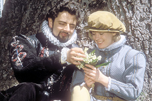 Blackadder. Image shows left to right: Lord Edmund Blackadder (Rowan Atkinson), Kate (Gabrielle Glaister). Credit: BBC