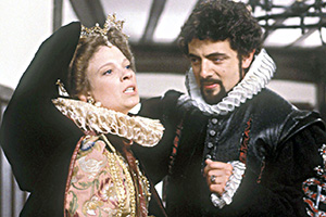 Blackadder. Image shows left to right: Lady Farrow (Holly De Jong), Lord Edmund Blackadder (Rowan Atkinson). Credit: BBC