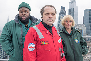 Bloods. Image shows from L to R: Maleek (Samson Kayo), Phil (Matthew Holness), Wendy (Jane Horrocks). Copyright: Roughcut Television