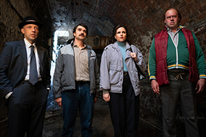 The Curse. Image shows from L to R: Phil 'The Captain' Pocket (Hugo Chegwin), Albert Fantoni (Allan Mustafa), Natasha (Emer Kenny), Big Mick Neville (Tom Davis)