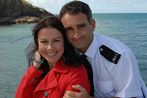 Doc Martin. Image shows from L to R: Maggie Reid (Julie Graham), PC Penhale (John Marquez)