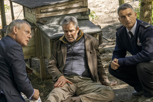 Doc Martin. Image shows from L to R: Dr Martin Ellingham (Martin Clunes), Robert Brooke (Danny Huston), PC Penhale (John Marquez)