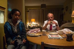 Don't Forget The Driver. Image shows from L to R: Rita (Luwam Teklizgi), Peter Green (Toby Jones)